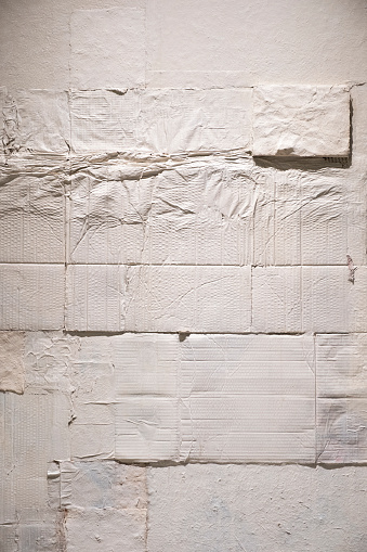 White concrete wall with plaster. Background texture