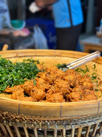 fish mixed with chili paste, pounded until sticky, and fried in hot oil