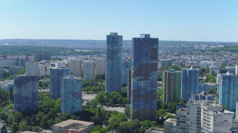 Aerial Dynamic View of La Défense: Paris Skyline with Landmarks. From Nature to La Défense