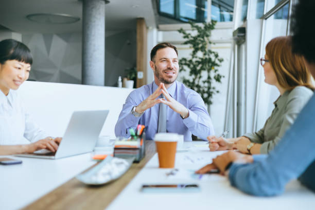 istock Business team engaged in a strategic meeting 2112305068