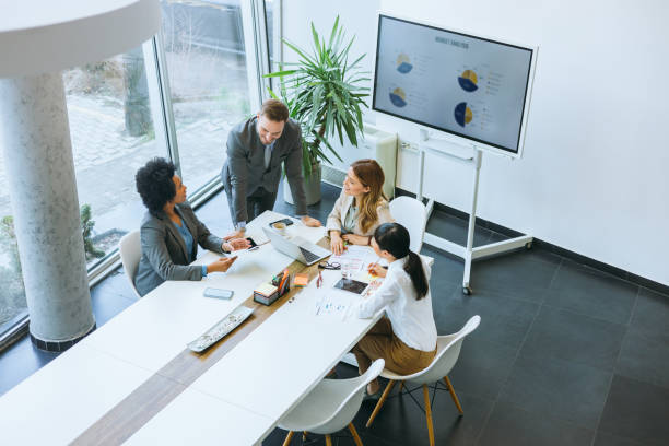 istock Business team brainstorming in modern office 2112305130