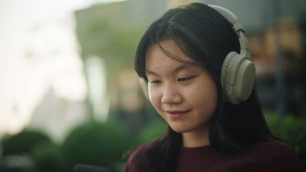 istock Teenage relax listening. 2112324959