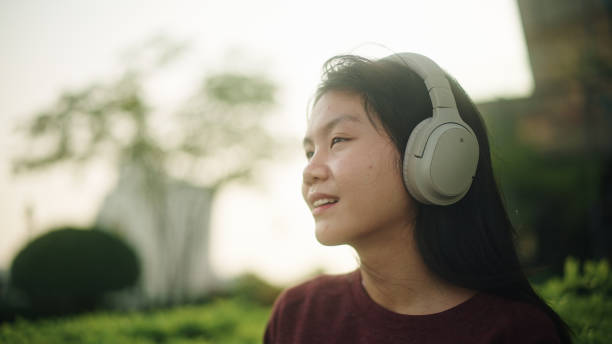 istock Teenage relax listening. 2112324984