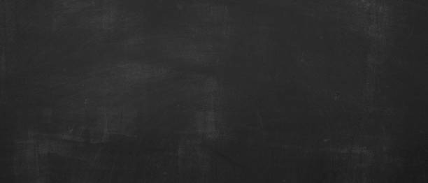 istock Black scratched anthracite blackboard chalkboard with chalk, concrete wall texture background, education backdrop 2112371831