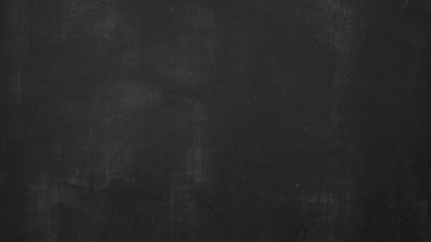 istock Black scratched anthracite blackboard chalkboard with chalk, concrete wall texture background, education backdrop 2112371840