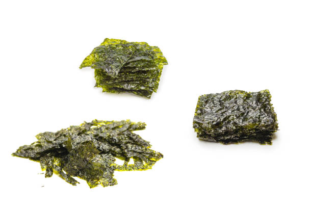 istock Tasty nori seaweed isolated on white background. 2112385537