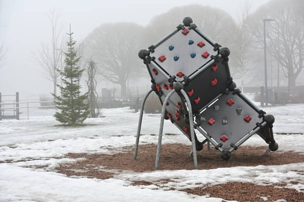 climbing cube on the playground in the park in winter