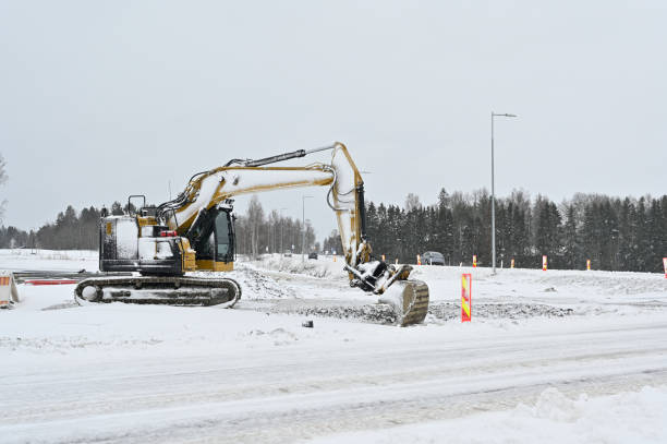 istock Excavator operating in snowy conditions 2112419038