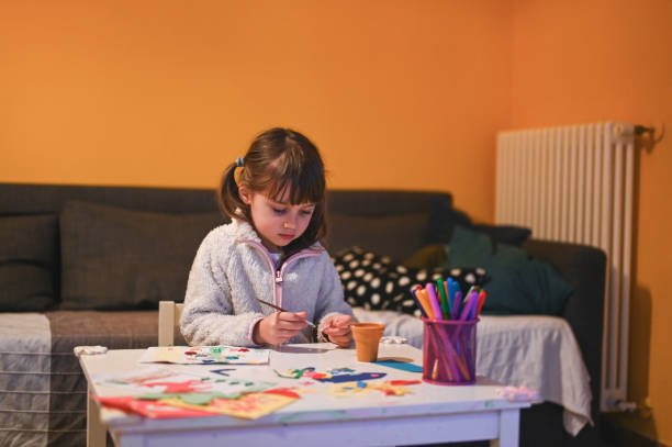istock Child enjoying craft art at home. 2112455219