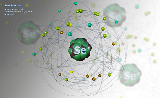 Atom of Selenium with detailed Core and its 34 Electrons on white with Atoms in background