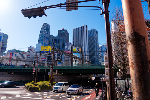 Scenic view of skyline with modern skyscrapers at City of Tokyo with urban road and cityscape on a sunny winter day. Photo taken January 27th, 2024, Tokyo, Japan.
