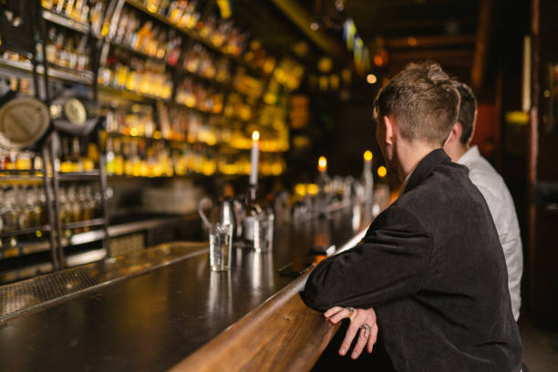 istock Old comrades drink elite whiskey in cozy restaurant 2112494785