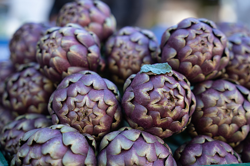 close up of artichokes in a street market