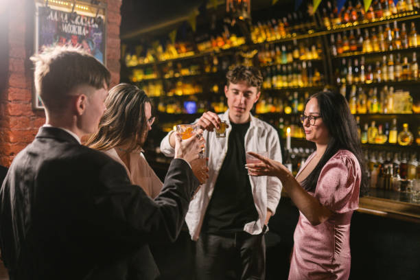 istock Couples in love have relax in pub with patriotic flags 2112610407