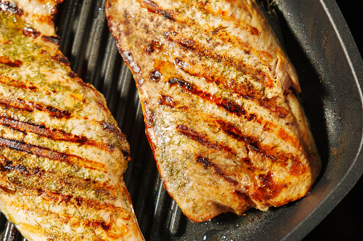 Grilled Salmon Fillets Unleashing Flavorful Melodies, close up