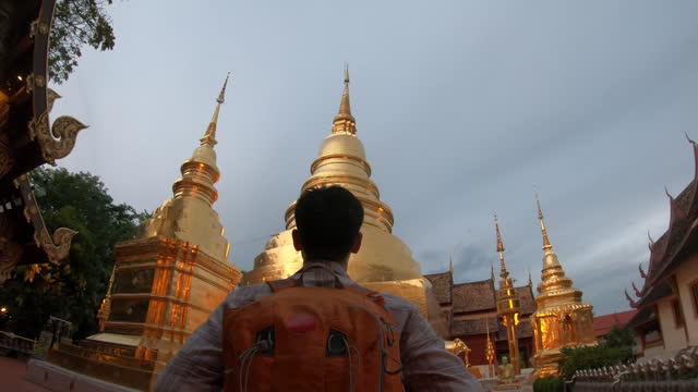Twilight show of Wat Phra Singh Woramahawihan shot in slow motion