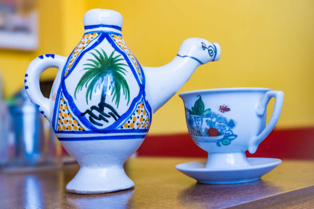 Traditional Arabic cappuccino jug in the shape of a camel. Cadeau carafe marocaine artisanat, dromadaire. High quality photo