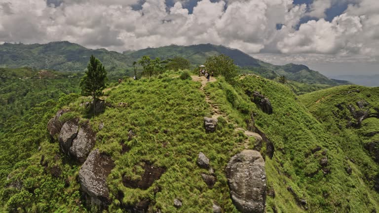 Ella Sri Lanka Aerial v25 panoramic panning view, drone fly around Little Adam's Peak capturing mountainous terrains, verdant valleys and highlands landscape - Shot with Mavic 3 Cine - April 2023