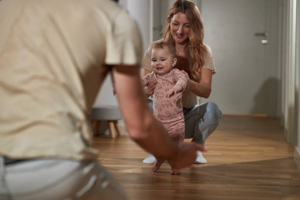 istock First steps of our baby 2112696051
