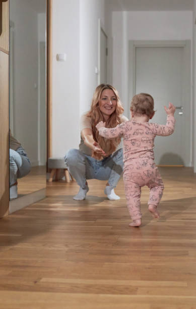 istock First steps of my baby 2112696560