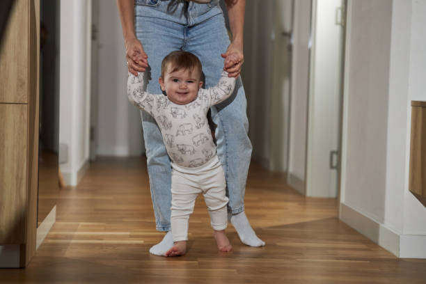istock First steps of my baby 2112697440