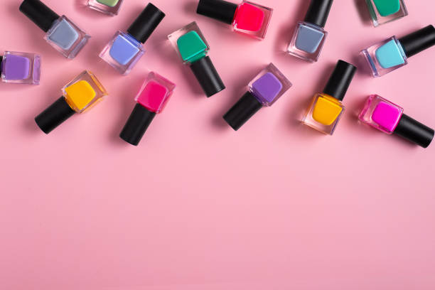 istock Pattern background of bottles colorful nail polish, top view, copy space 2112707342