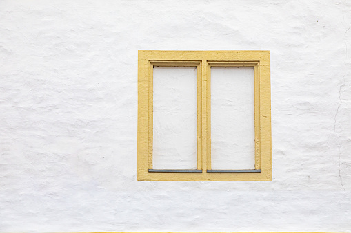 background of old window frame with bricked up window in white color