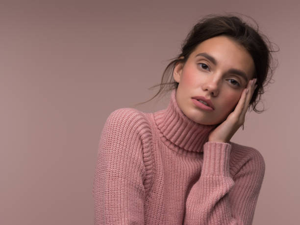 istock Beautiful sensual girl wearing sweater 2112743182