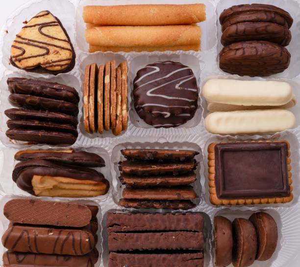 Close-up taken of round,sweet biscuits in own package at the white background.