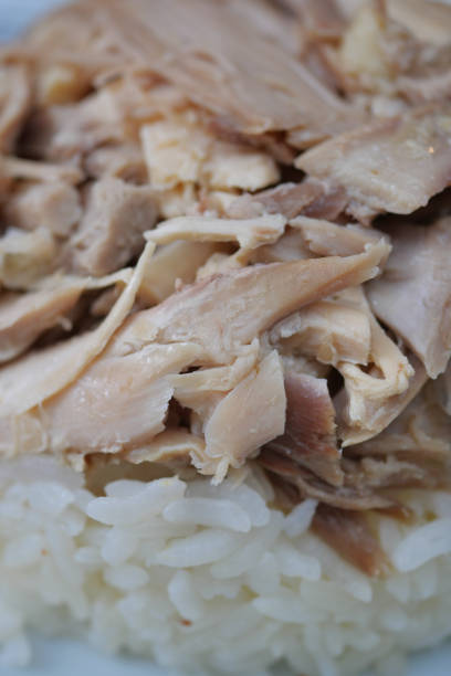 istock Boiled chicken, steamed rice, pink plate. 2112755386
