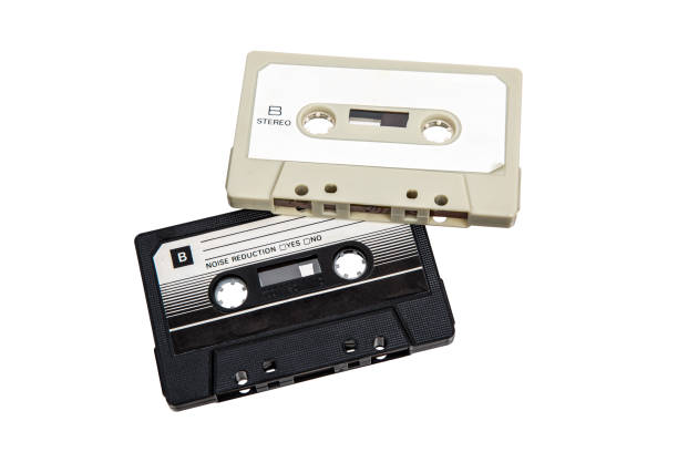istock Close-up of an audio cassettes with a sticker without text.  Analog storage medium. Cassettes for audio recordings and music. 2112756115