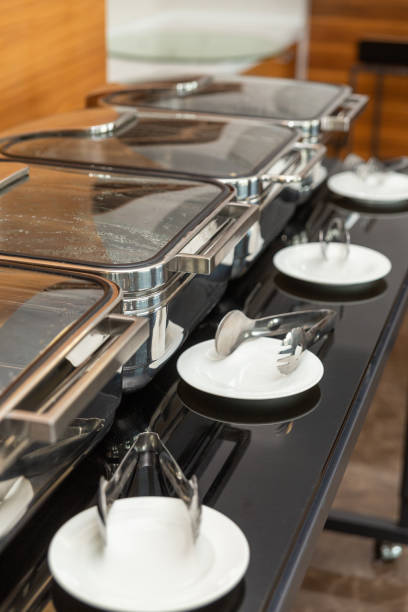 istock Row of closed chafing dishes 2112761251