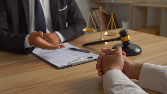 Lawyer accepting bribe concept for signing legal contract approval, rights of liberty, bribery, Concept of law, justice, court trial, and professional legal services, judge.