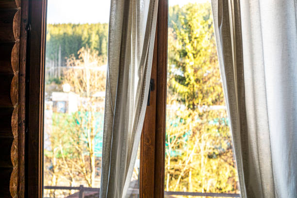 istock modern window with light curtains in a healthy house 2112768398