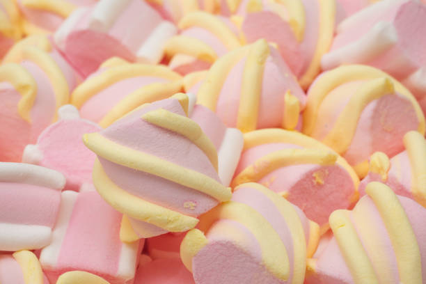 Colorful marshmallow candies for background use close up.