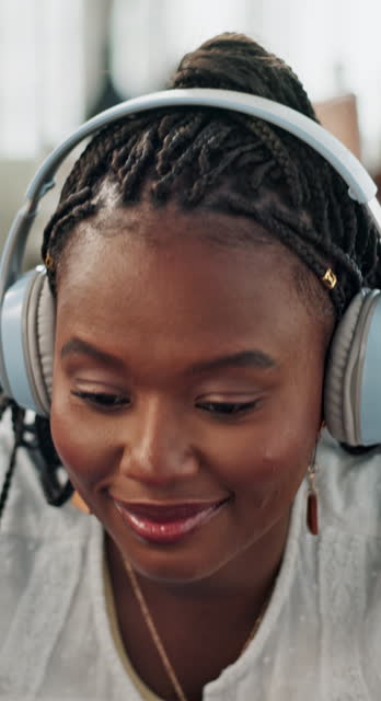 Music, headphones and black woman on laptop in home, listening to audio or sound to relax. Face, radio and African person on computer, streaming song online or enjoy freedom on internet technology
