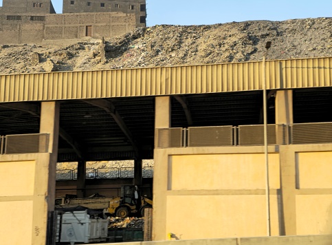 Cairo, Egypt, March 23 2024: waste collection station, as a preparation for waste recycling, to be transferred to Material Recycling Facility, Waste Transfer Stations are where waste is taken, selective focus