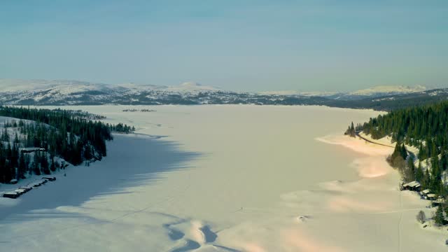 aerial shoot over a frozen lake in Norway