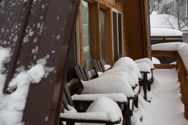 Snowy cabin in the Rocky Mountains. Vacation home.
