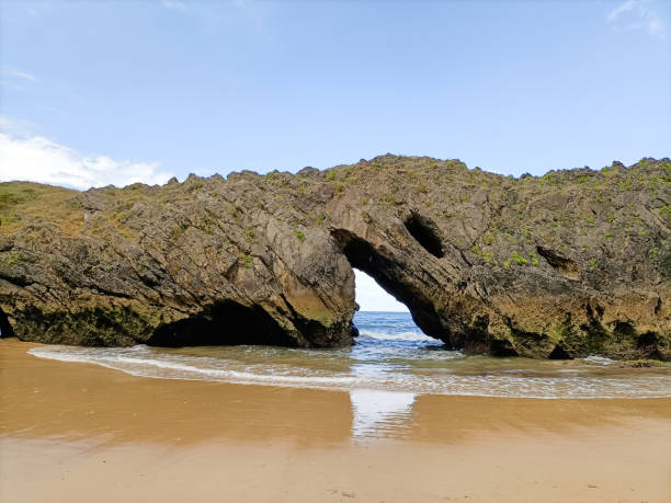 istock Rock formation in San Antolin beach, Spain 2112834699