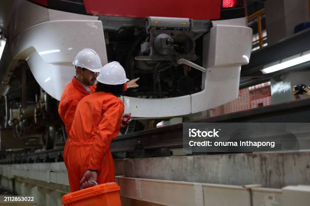Train Engineer Devil Two Dedicated Train Engineers In Their Safety Helmets And Uniforms ...