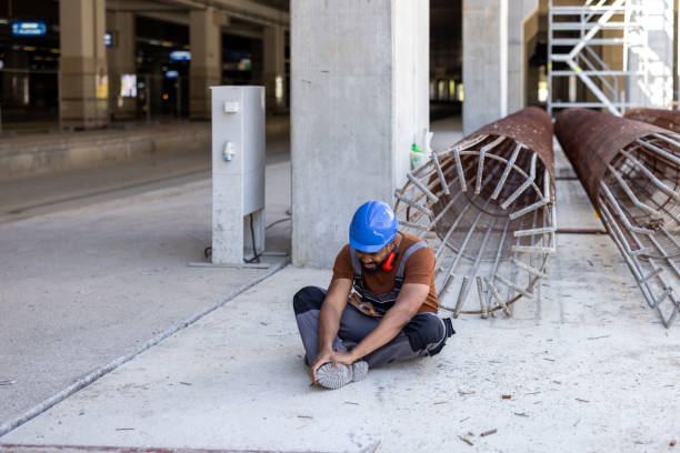 istock Young Worker at a Building Site has Suffered an Injury. 2112900022