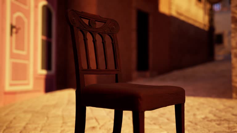 A brown chair sitting on top of a brick floor