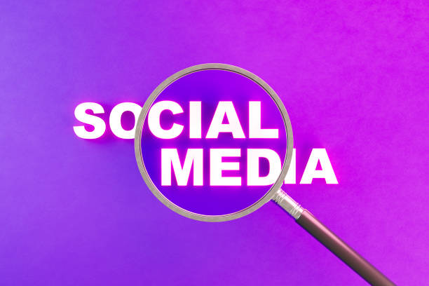 Social Media concept with magnifying glass on neon background. Digitally generated image. 3d render.