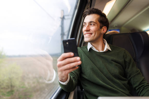 istock A Man in Smart Casual Clothes Travels by Train 2113011513