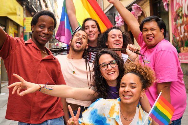 istock A group of people are posing for a picture during the Pride Parade. 2113039265
