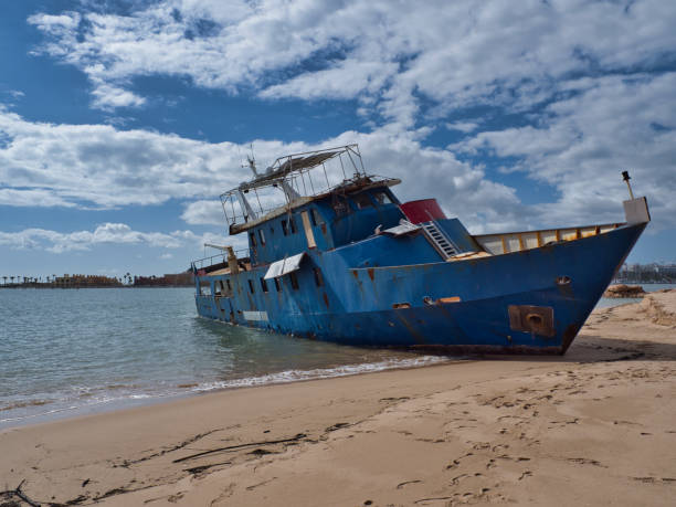 Old shipwreck about coast of Kunashir island, Kurils islands, gloomy weather