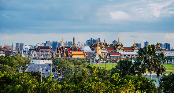 A beautiful panoramic view overlooking the grandeur of Bangkok, Thailand, featuring the iconic Grand Palace amidst the bustling city.