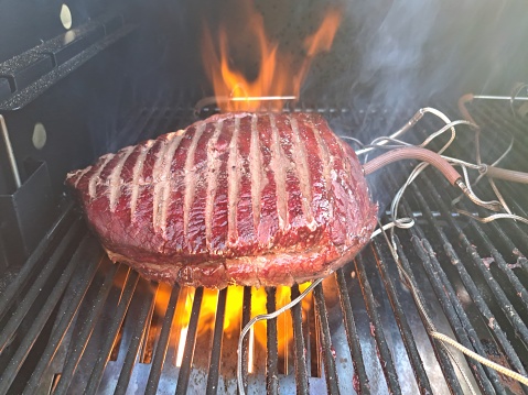Picanha (sirloin cap) smoked and seared over the open flame on the pellet smoker