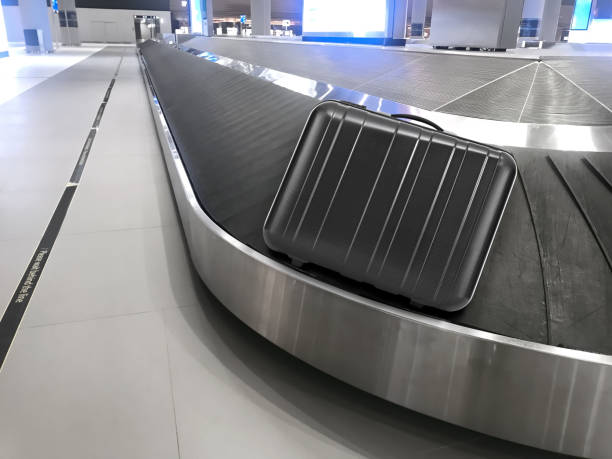 istock Luggage on a carousel in airport 2113331734